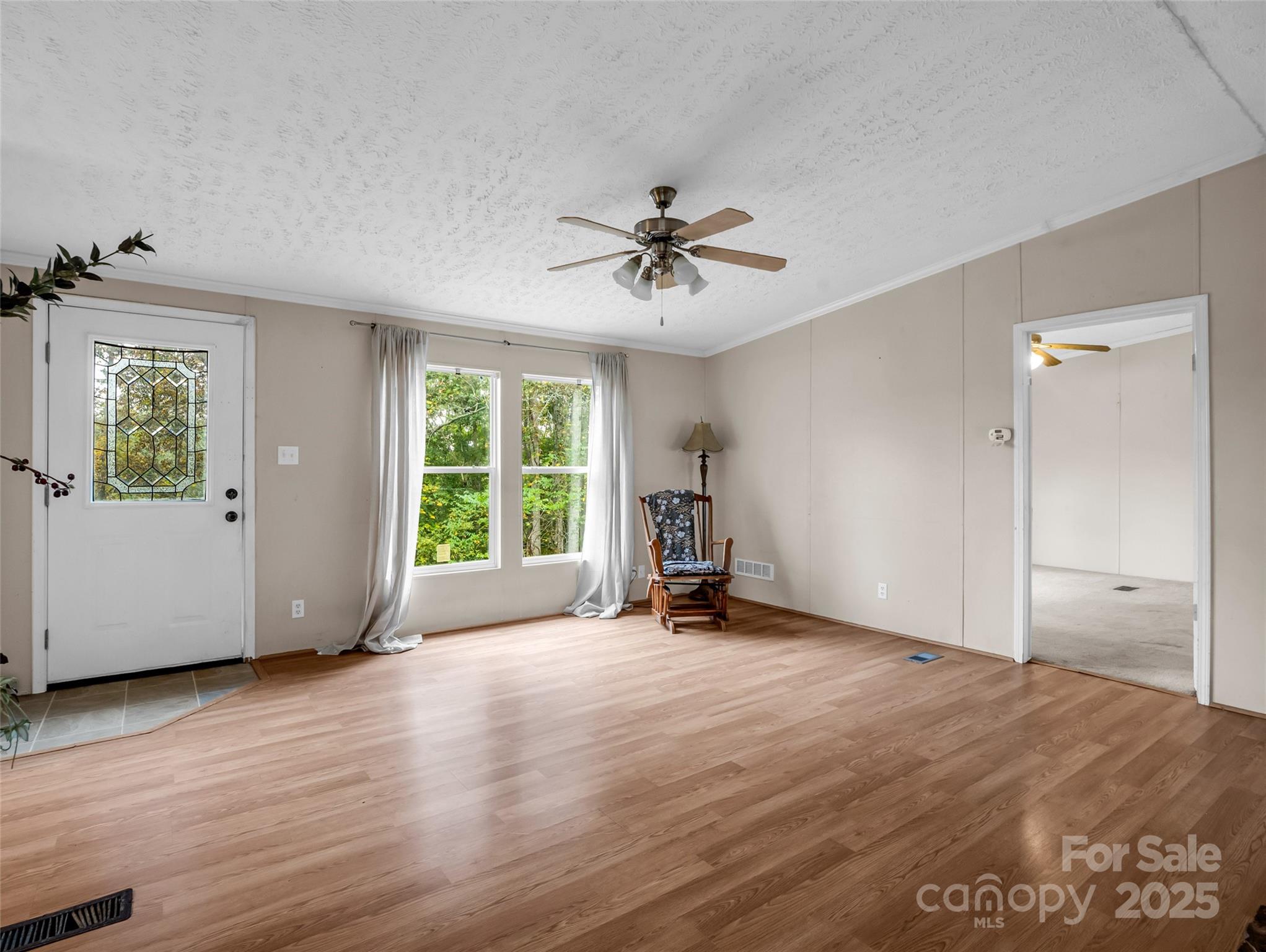 114 Leonards Lane Weaverville, NC 28787 - Photo 5 of 34 a view of an empty room with a window