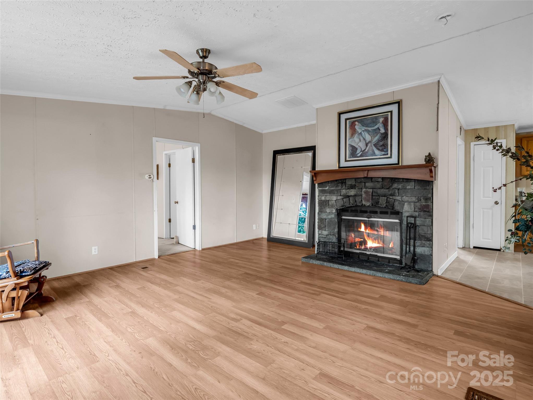 114 Leonards Lane Weaverville, NC 28787 - Photo 6 of 34 a view of an empty room with a fireplace and a window
