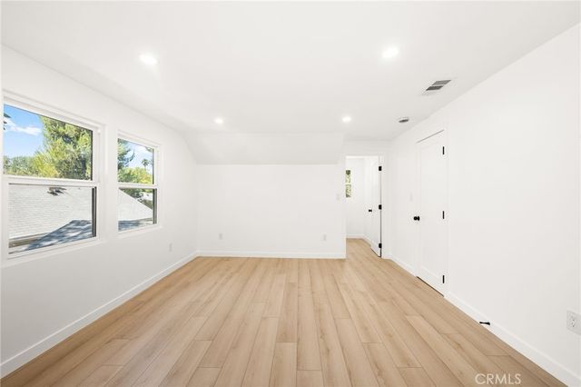 a view of a room with white walls