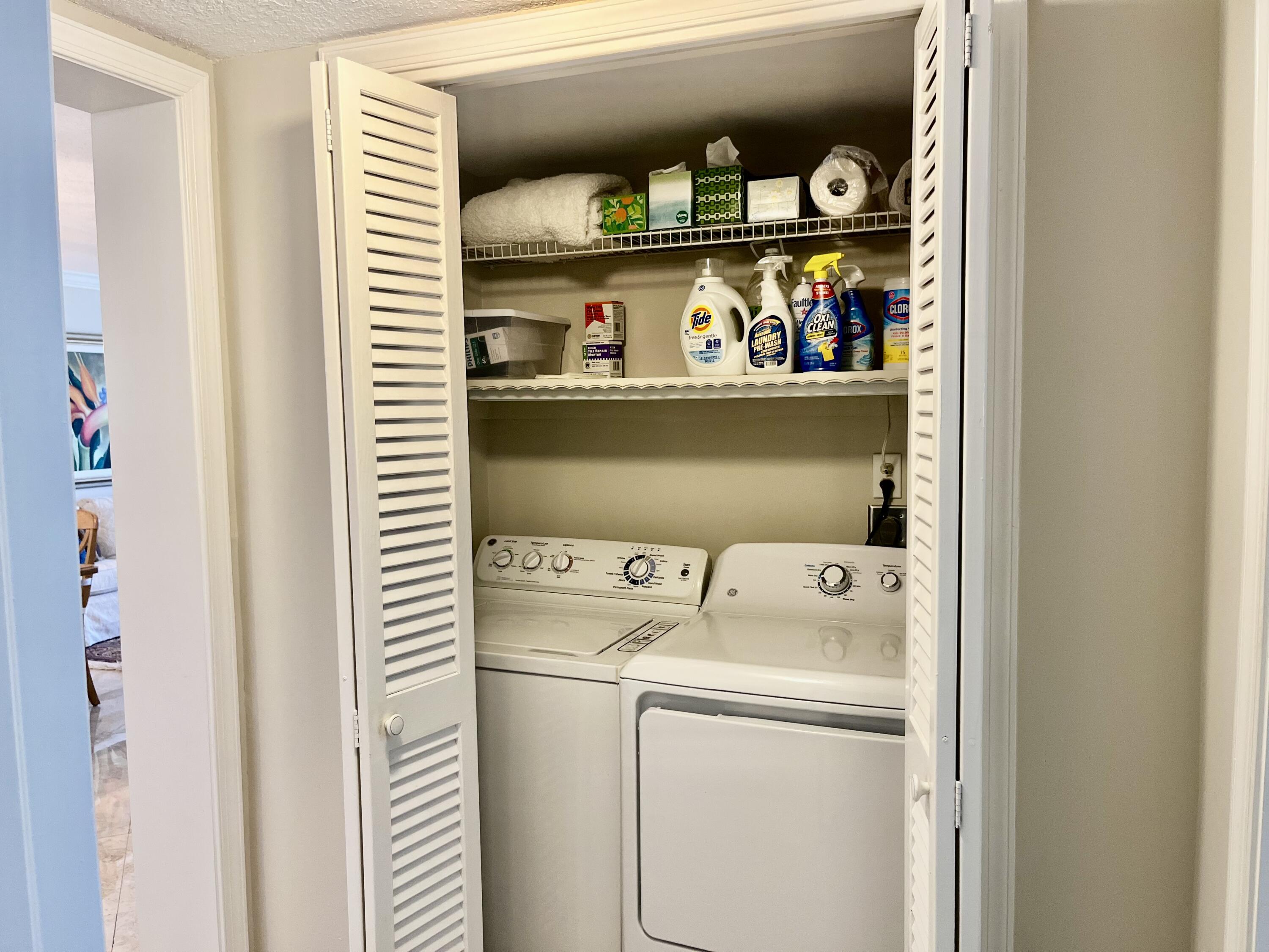 145 Atlantis Boulevard, Unit PH4 Atlantis, FL 33462 - Photo 17 of 27 a view of washer and dryer