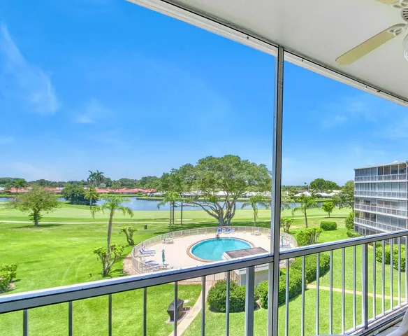 a view of a city street from a balcony