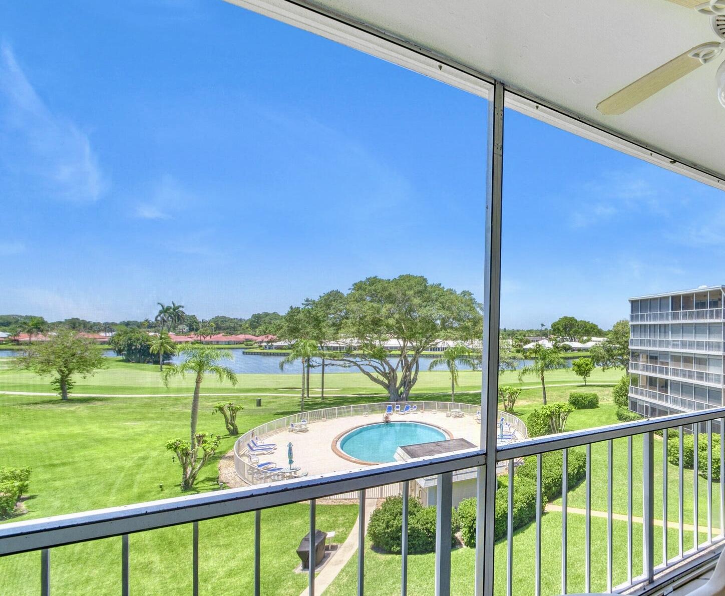 145 Atlantis Boulevard, Unit PH4 Atlantis, FL 33462 - Photo 19 of 27 a view of lake from balcony