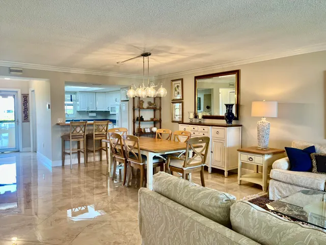 a living room with furniture or couch and a wooden floor