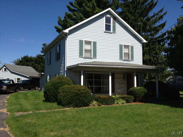 404 West Moorestown Road Nazareth, PA 18064 - Photo 1 of 12 a front view of house with yard and green space