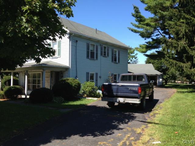 404 West Moorestown Road Nazareth, PA 18064 - Photo 2 of 12 a front view of a house with a garden