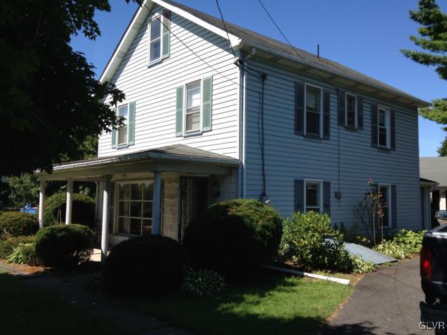 404 West Moorestown Road Nazareth, PA 18064 - Photo 3 of 12 a front view of a house with a garden