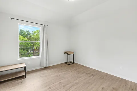 a view of a room with a window