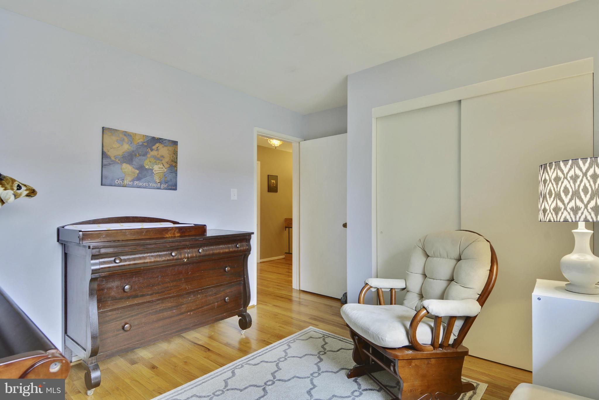 11706 Indian Ridge Road Reston, VA 20191 - Photo 16 of 30 a living room with furniture and a window