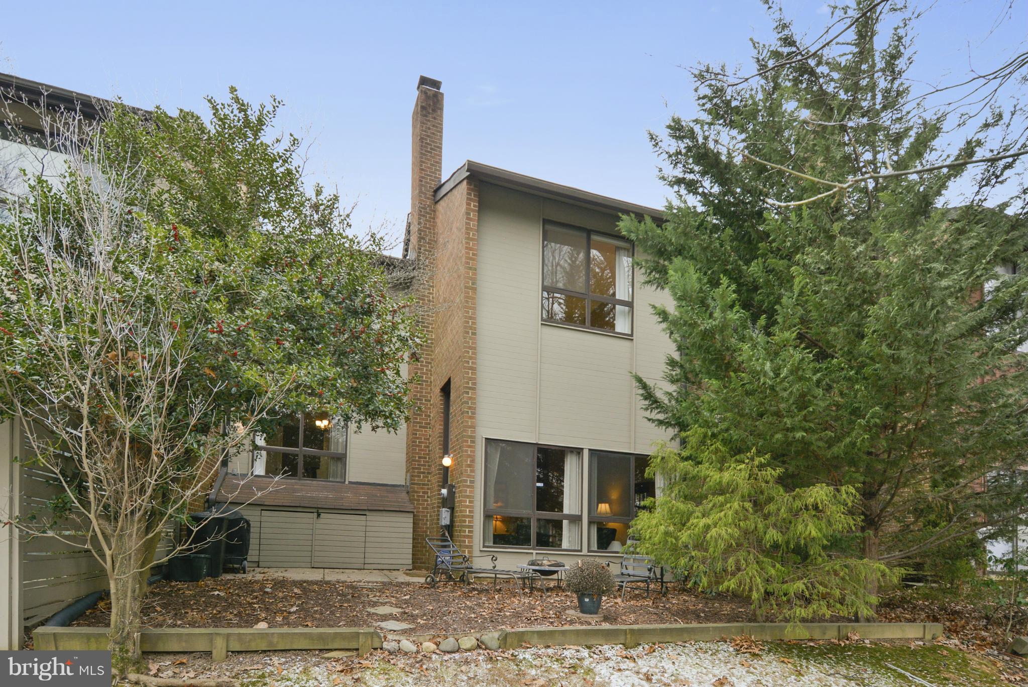 11706 Indian Ridge Road Reston, VA 20191 - Photo 22 of 30 a front view of a house with garden