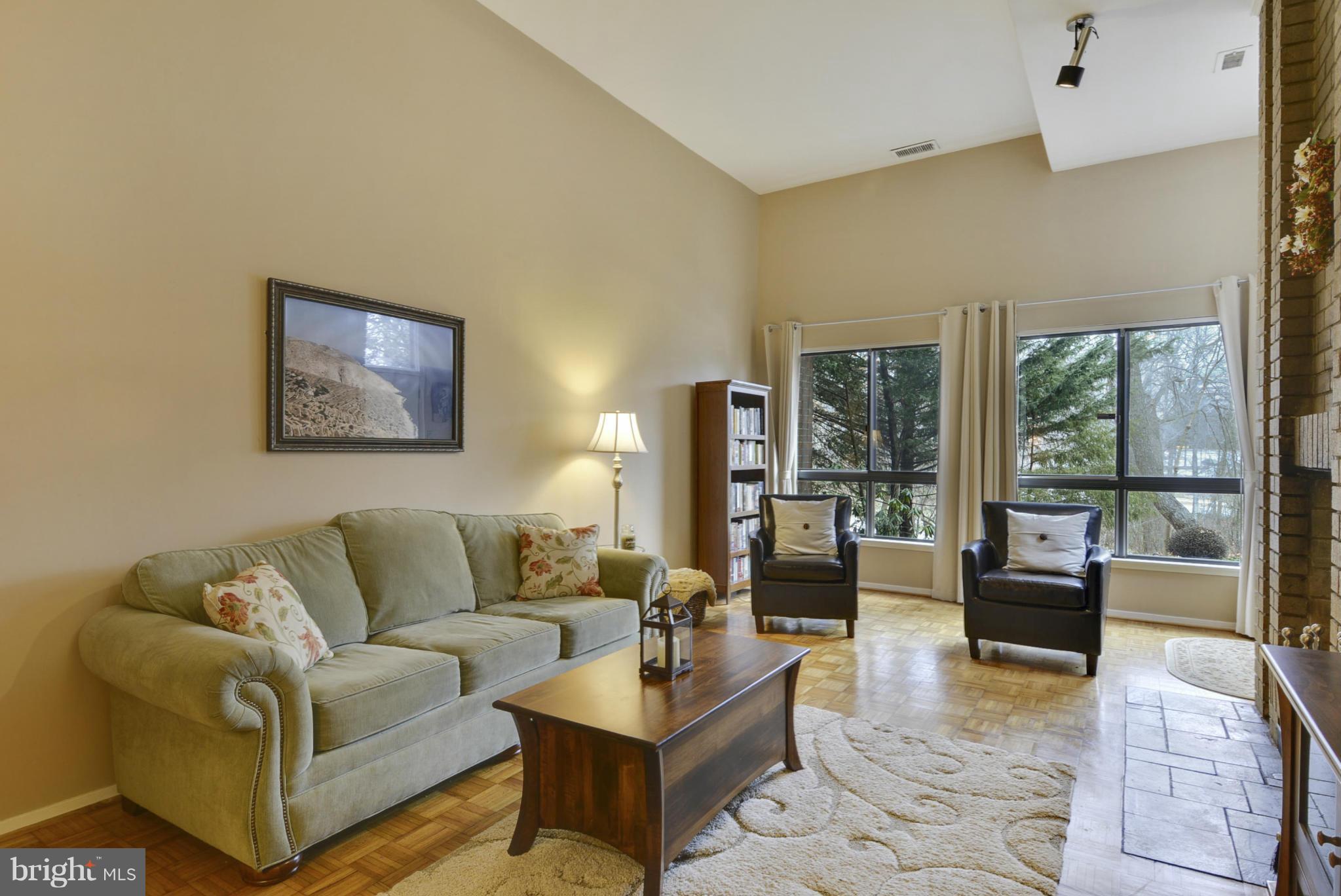 11706 Indian Ridge Road Reston, VA 20191 - Photo 9 of 30 a living room with furniture and a large window