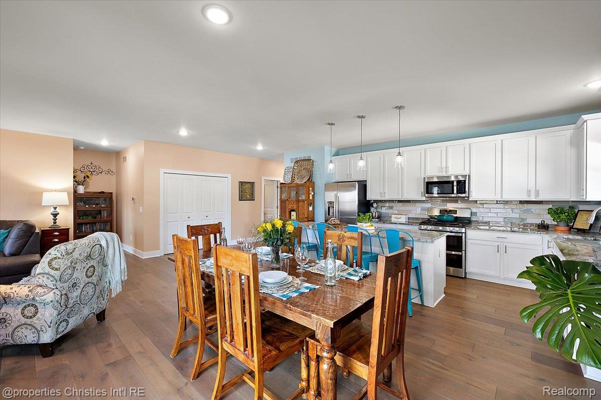 913 Ridge Road South Canton, MI 48188 - Photo 23 of 51 Dining space featuring dark wood-style floors and recessed lighting