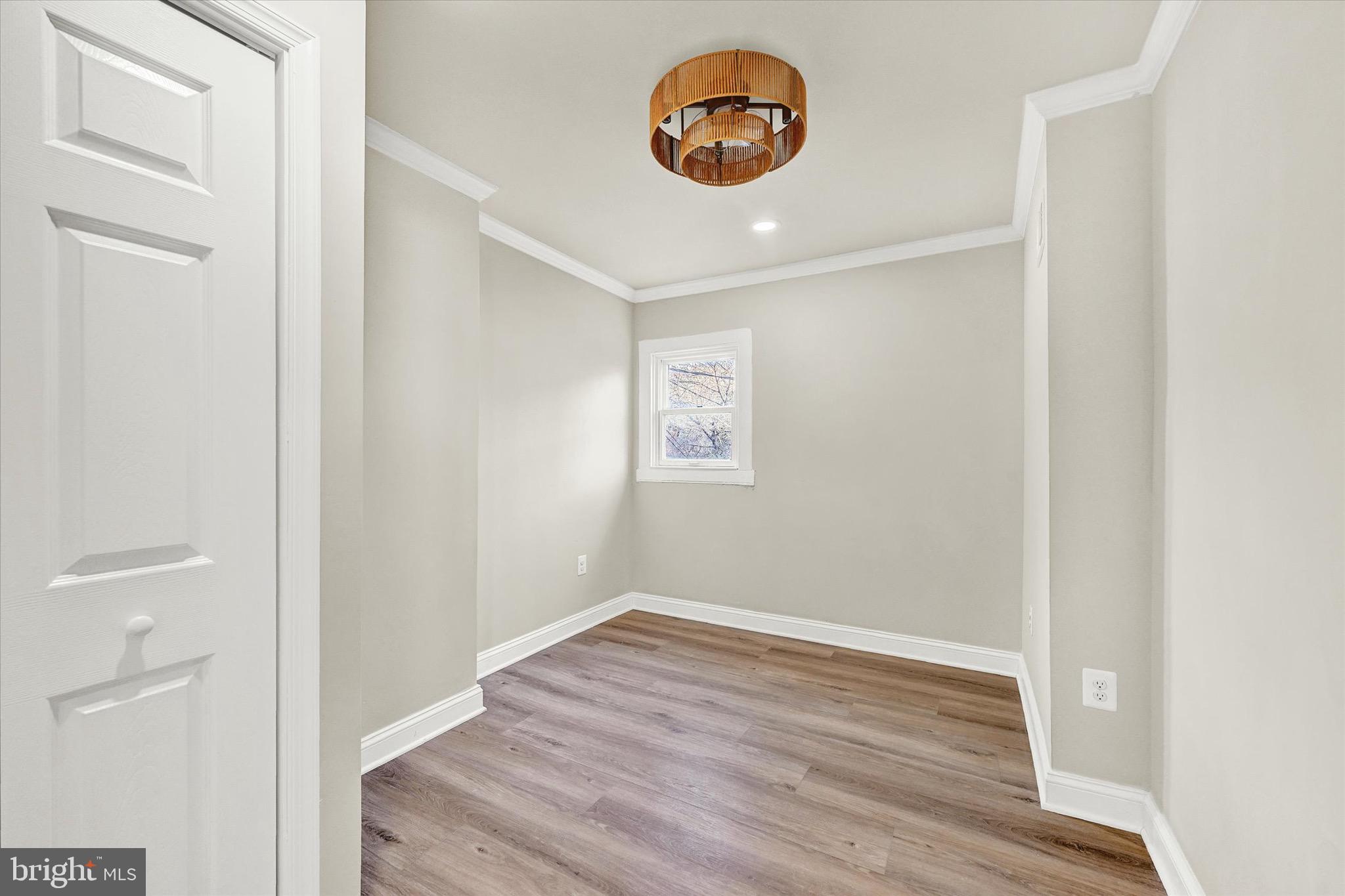 1304 Rutter Street Baltimore, MD 21217 - Photo 17 of 26 a view of a room with wooden floor