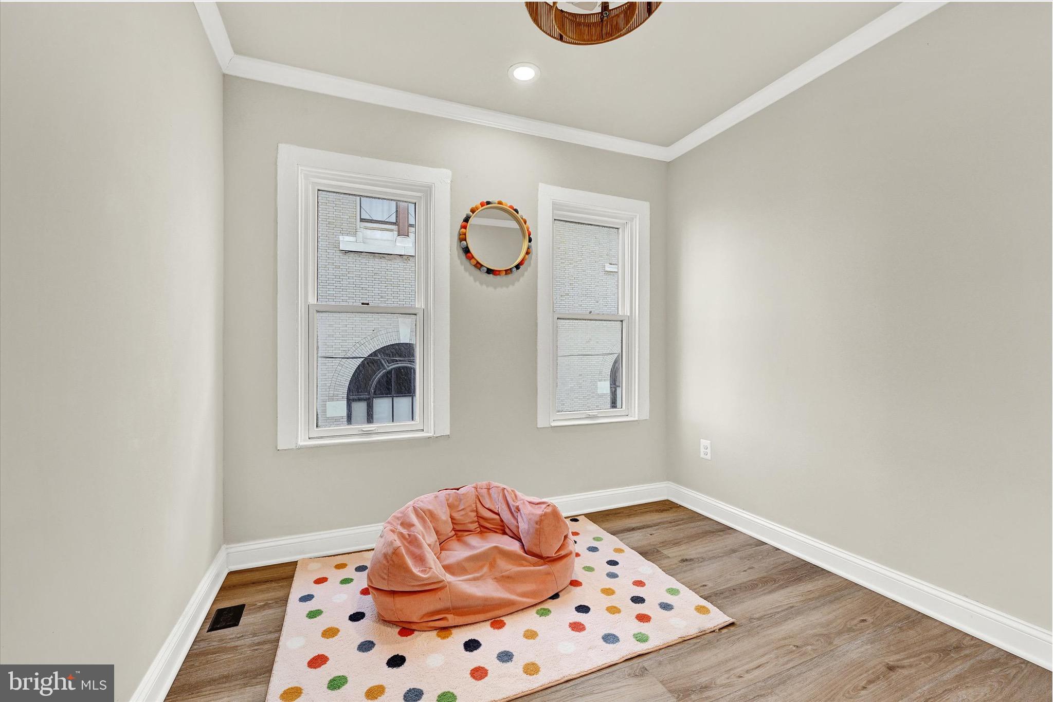 1304 Rutter Street Baltimore, MD 21217 - Photo 19 of 26 a bedroom with bed and window