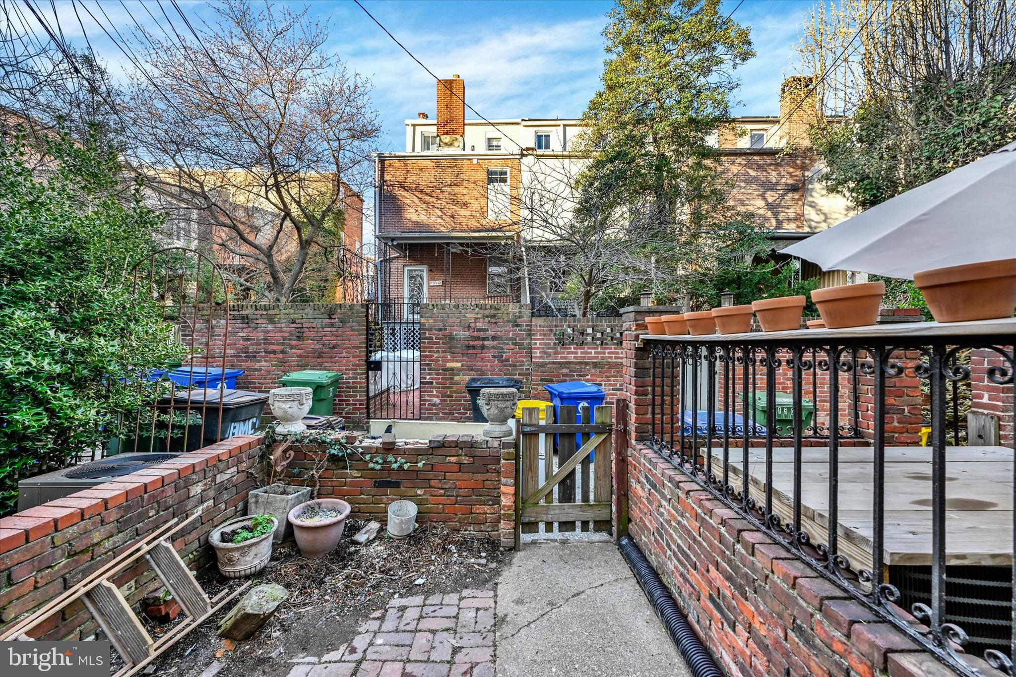 1304 Rutter Street Baltimore, MD 21217 - Photo 25 of 26 a view of an outdoor sitting area with a fountain