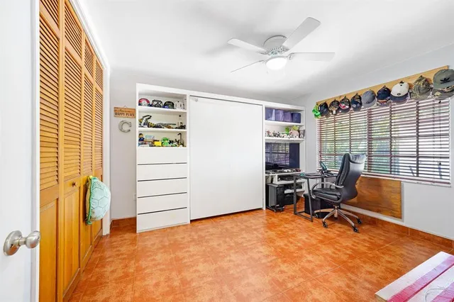 a room with furniture and musical instruments