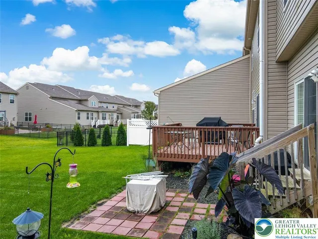 a view of a deck with a yard