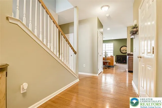 a view of an entryway and livingroom with furniture