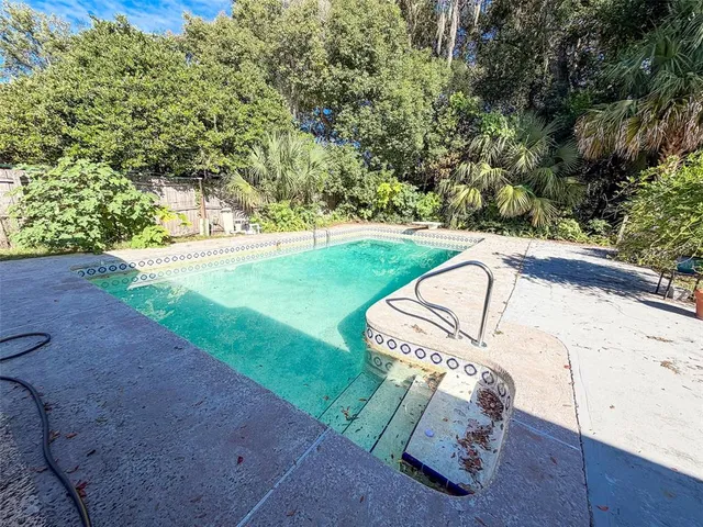 a view of a backyard with a small cabin
