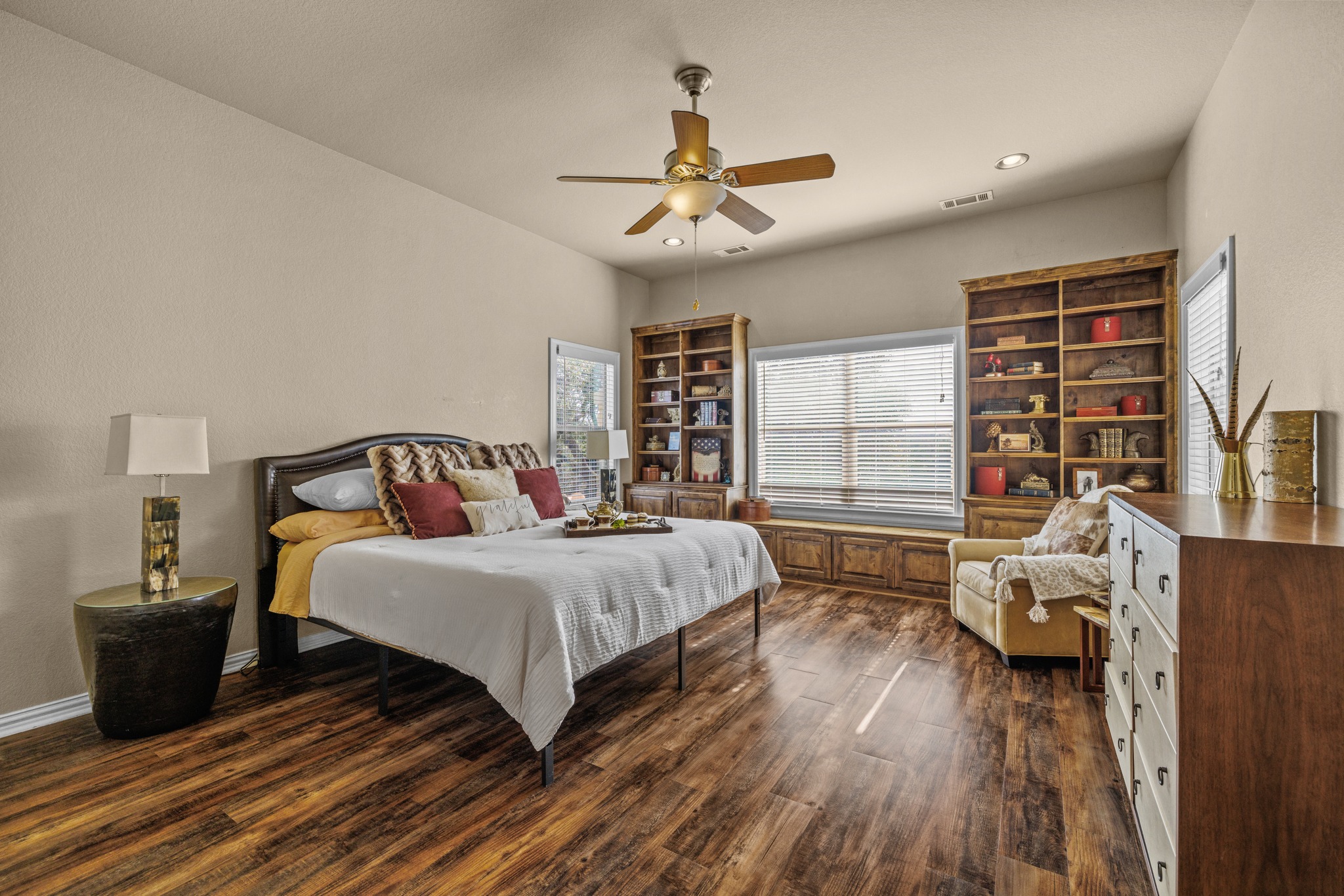 204 Skyline Road Georgetown, TX 78628 - Photo 25 of 40 Bedroom with dark wood-style flooring, a ceiling fan, and recessed lighting