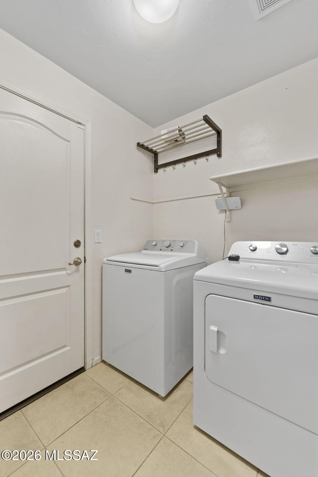 13668 East High Plains Ranch Street Vail, AZ 85641 - Photo 38 of 51 a utility room with dryer and washer