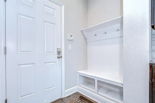 a view of a backyard with sitting area