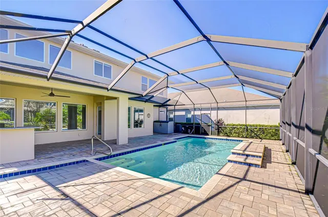 a view of a backyard with a patio