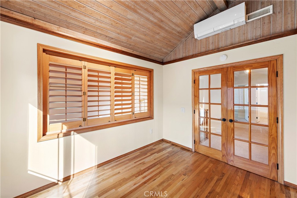 24372 Barbados Drive Dana Point, CA 92629 - Photo 21 of 39 a view of empty room with wooden floor and fan