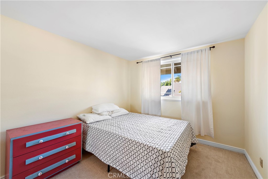 24372 Barbados Drive Dana Point, CA 92629 - Photo 22 of 39 a bedroom with a bed and a window