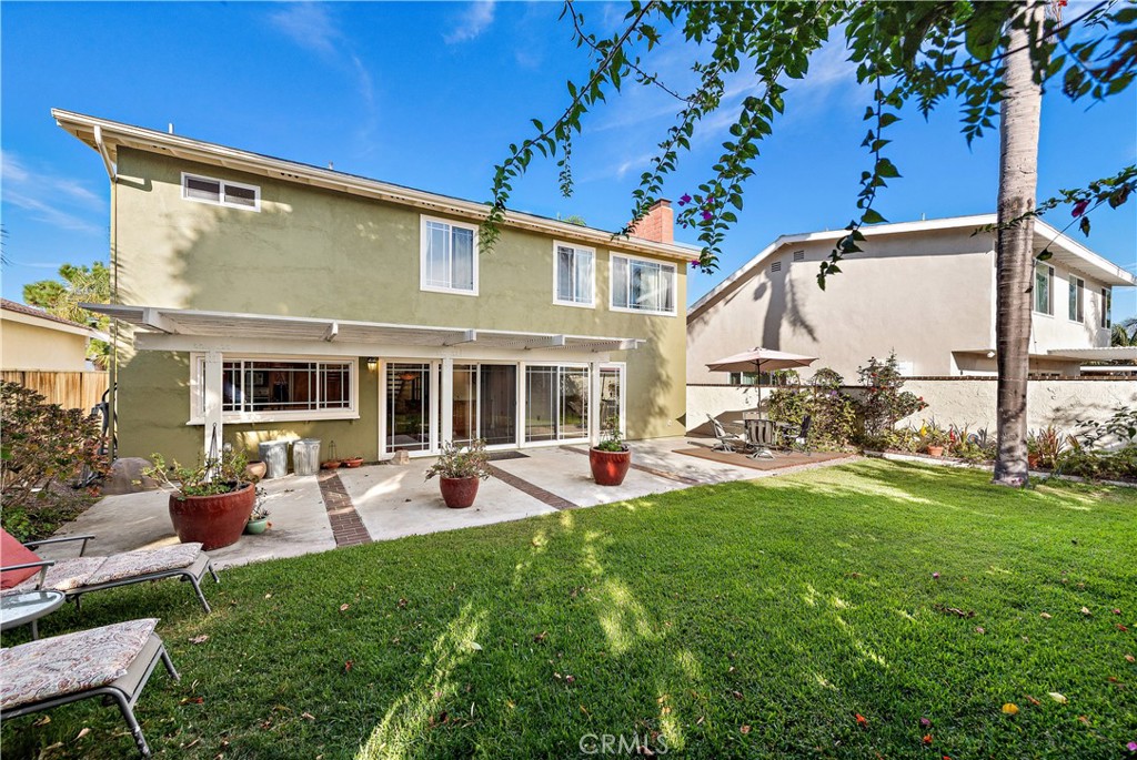 24372 Barbados Drive Dana Point, CA 92629 - Photo 27 of 39 a view of a house with backyard sitting area and garden