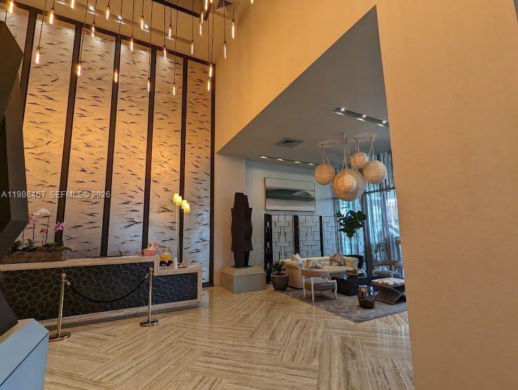 2900 Northeast 7th Avenue, Unit 1003 Miami, FL 33137 - Photo 14 of 15 a view of living room with furniture and floor to ceiling window