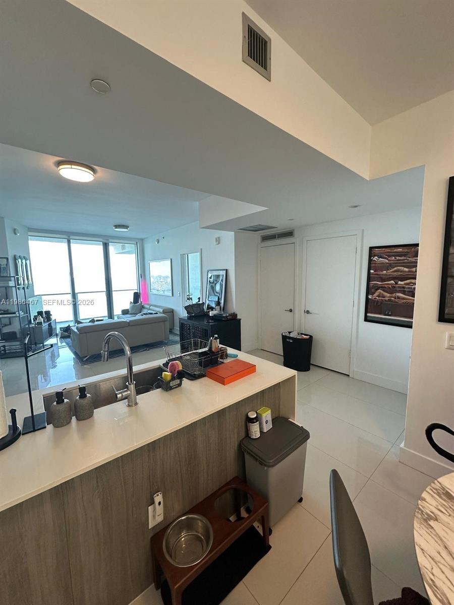 2900 Northeast 7th Avenue, Unit 1003 Miami, FL 33137 - Photo 7 of 15 a room with furniture pool table and window