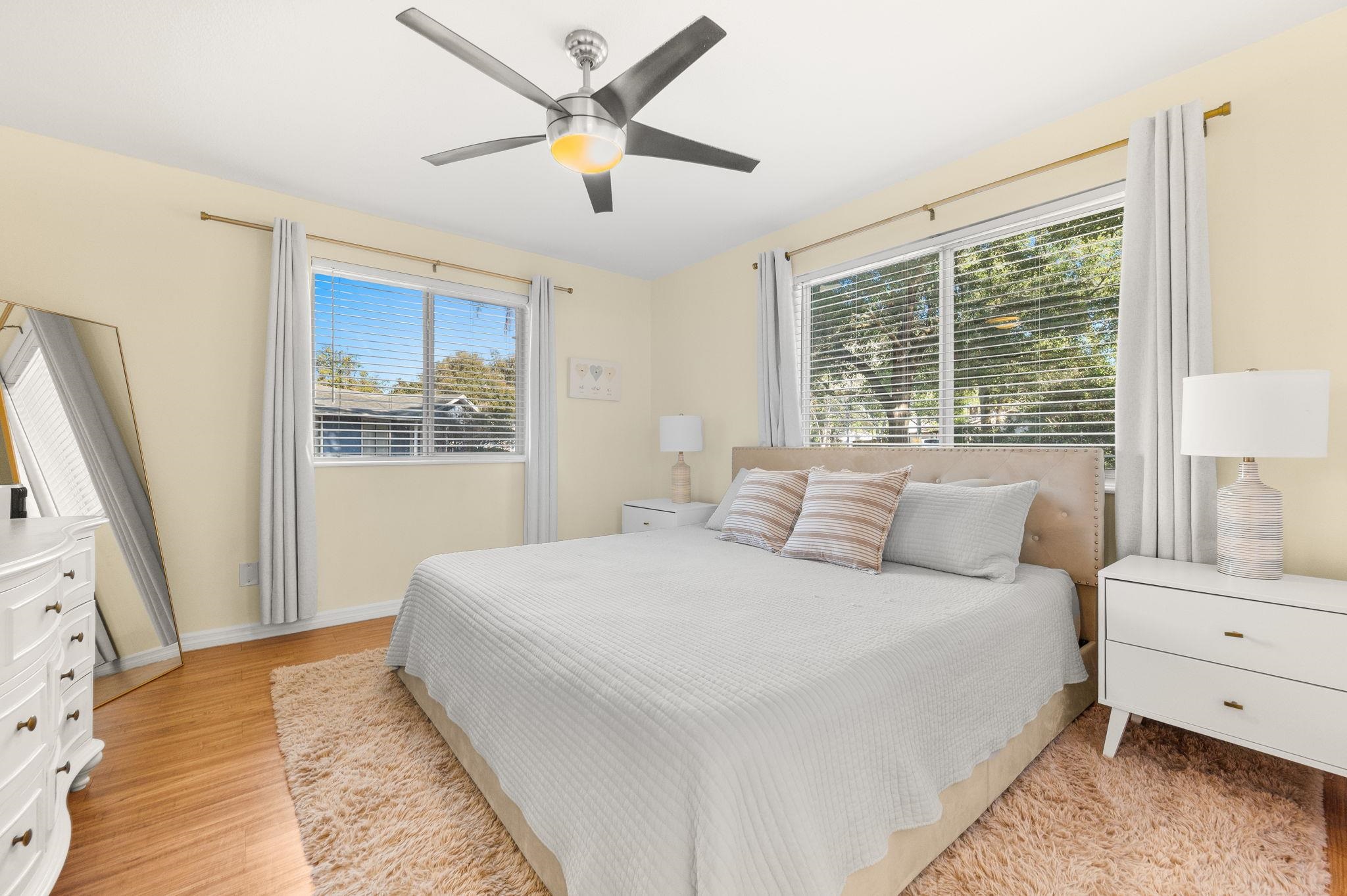 4233 Oak Lane St. Augustine, FL 32086 - Photo 31 of 42 Bedroom featuring ceiling fan and light wood finished floors