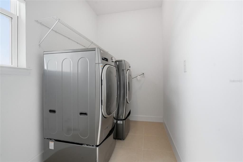 34068 Castaway Loop Wesley Chapel, FL 33543 - Photo 28 of 65 a view of water heater room