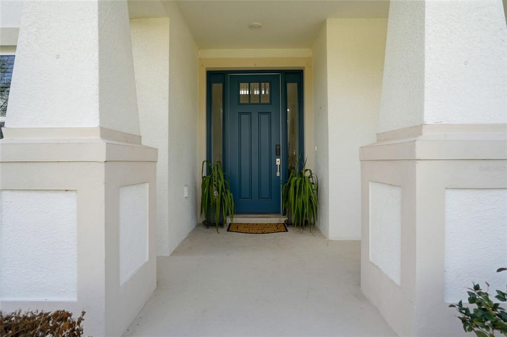 34068 Castaway Loop Wesley Chapel, FL 33543 - Photo 3 of 65 a view of an entryway of the house