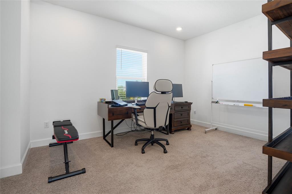 34068 Castaway Loop Wesley Chapel, FL 33543 - Photo 38 of 65 a view of a workspace with furniture