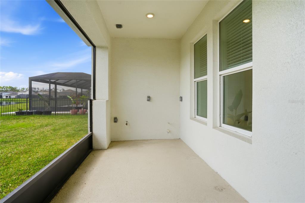 34068 Castaway Loop Wesley Chapel, FL 33543 - Photo 45 of 65 a view of a porch