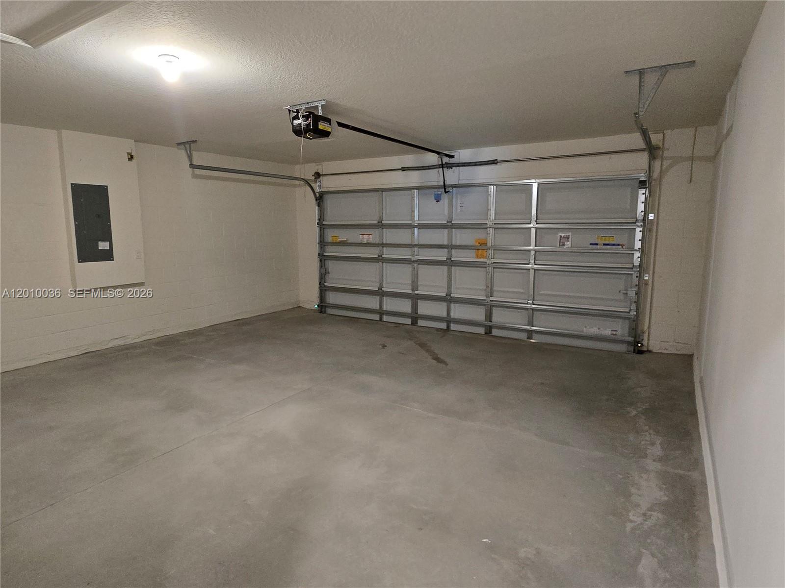 9871 Southeast 161st Lane Road Summerfield, FL 34491 - Photo 23 of 31 a view of a garage