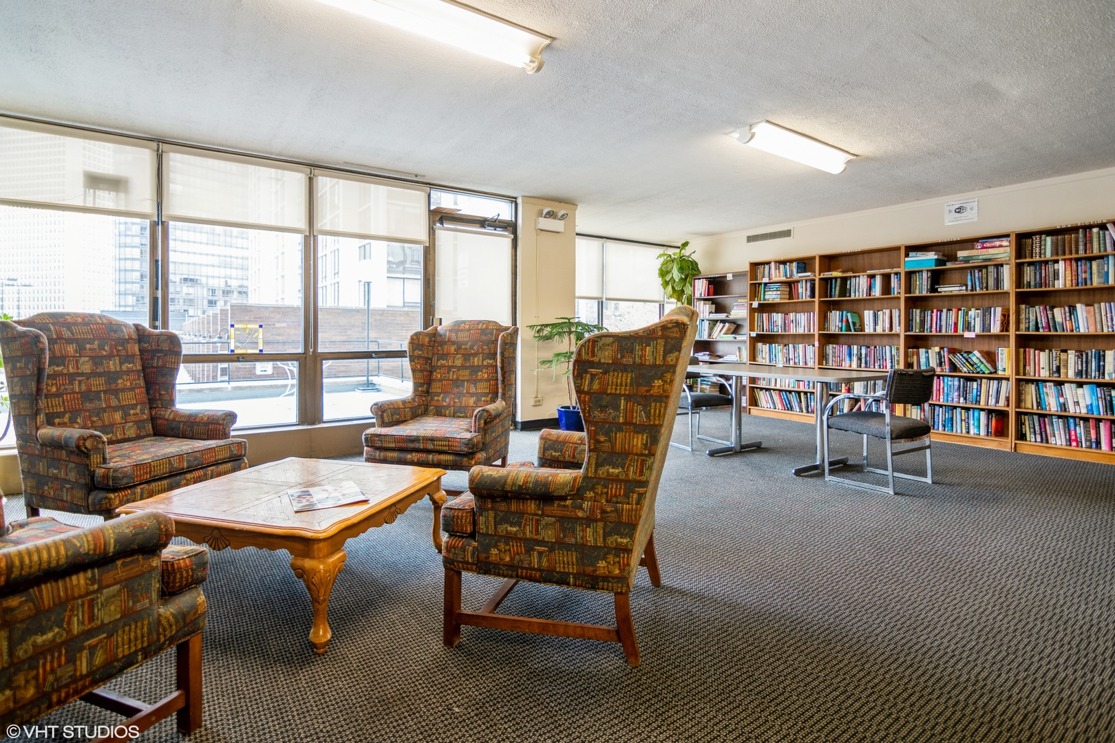 5455 North Sheridan Road, Unit 2403 Chicago, IL 60640 - Photo 19 of 20 a living room with furniture and a large window