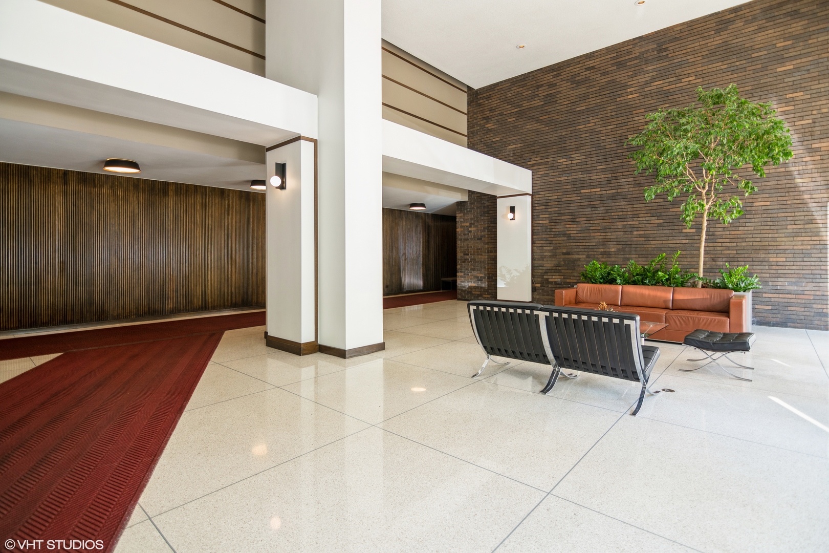 5455 North Sheridan Road, Unit 2403 Chicago, IL 60640 - Photo 20 of 20 a view of a patio with table and chairs
