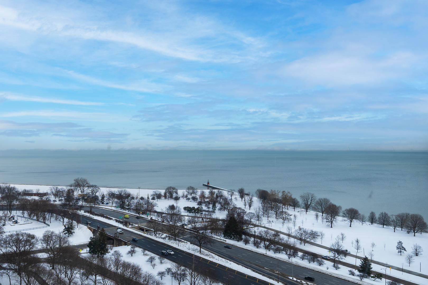 5455 North Sheridan Road, Unit 2403 Chicago, IL 60640 - Photo 2 of 20 a view of a city and ocean