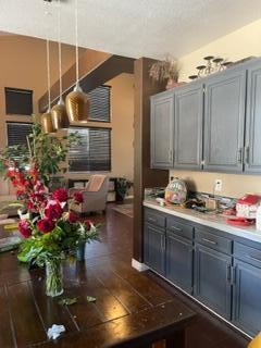 42107 Quail Run Way Lancaster, CA 93536 - Photo 17 of 38 a room with lots of flowers and cabinets