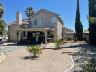 42107 Quail Run Way Lancaster, CA 93536 - Photo 24 of 38 a view of a house with a patio