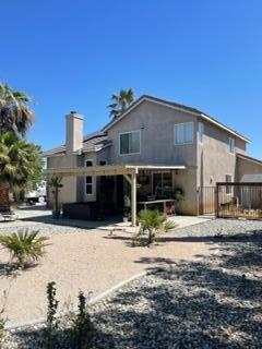 42107 Quail Run Way Lancaster, CA 93536 - Photo 25 of 38 a front view of a house with a yard