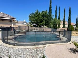 42107 Quail Run Way Lancaster, CA 93536 - Photo 27 of 38 a house view with a backyard space