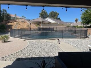 42107 Quail Run Way Lancaster, CA 93536 - Photo 29 of 38 a view of a house with a backyard