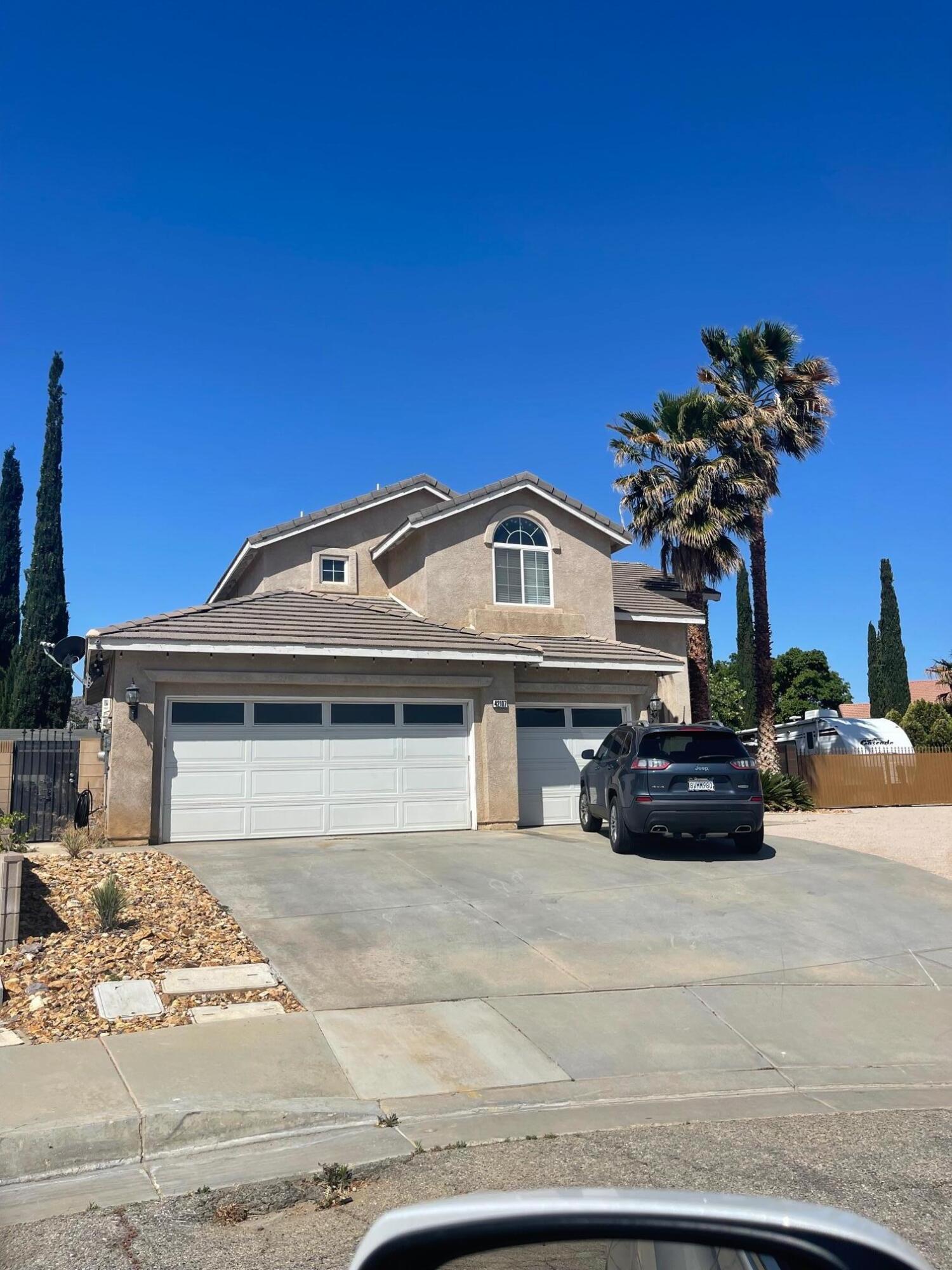 42107 Quail Run Way Lancaster, CA 93536 - Photo 3 of 38 a view of a house with a patio