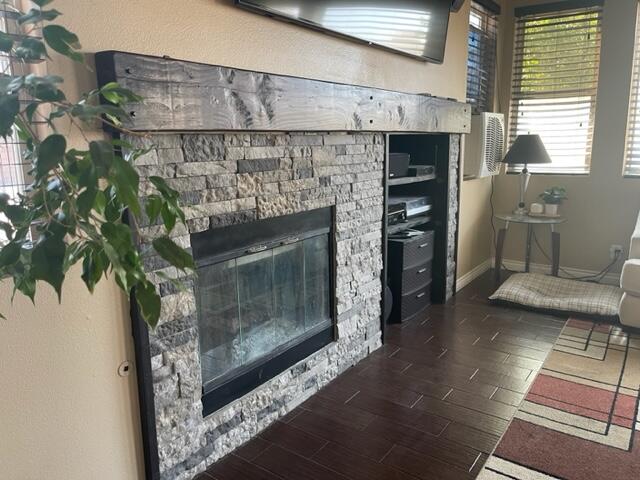 42107 Quail Run Way Lancaster, CA 93536 - Photo 5 of 38 a living room with furniture and a fireplace