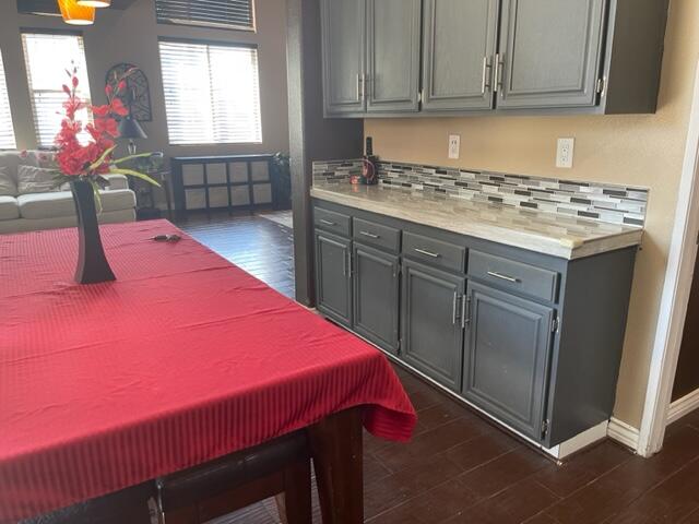 42107 Quail Run Way Lancaster, CA 93536 - Photo 8 of 38 a kitchen with a sink cabinets and wooden floor