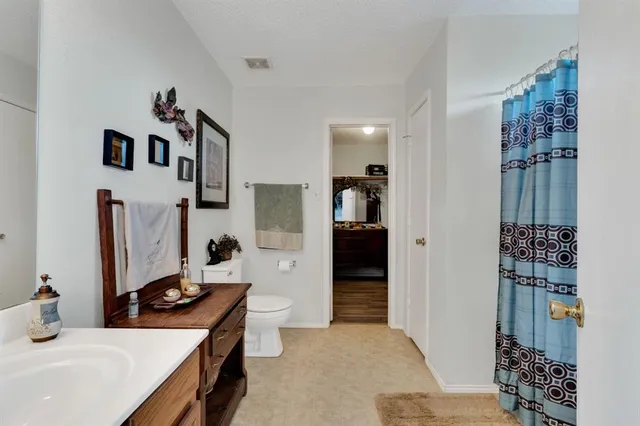 a view of a patio with a table chairs and a table