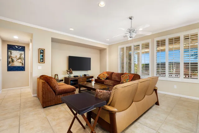 a kitchen with stainless steel appliances granite countertop a sink refrigerator and cabinets